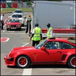 Red Porsche 911 at the Silverstone Classic 2013