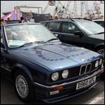 Blue BMW E30 3-Series convertible at the Silverstone Classic 201