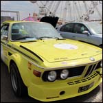 Yellow BMW CSL Batmobile at the Silverstone Classic 2013