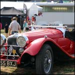 Red SS Jaguar at the Silverstone Classic 2013