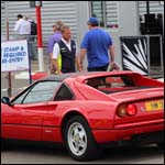 Red Ferrari 328 GTS at the Silverstone Classic 2013