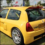 Yellow Renault Clio V6 Trophy at the Silverstone Classic 2013
