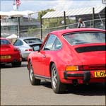Red Porsche 911 LGH129N at the Silverstone Classic 2013