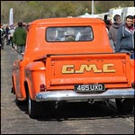 Orange GMC Truck 465UXD