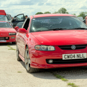 CW04NLL Red Holden Vauxhall Monaro - SW39 Dave Smith