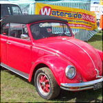 Red VW Beetle convertible YBU395H