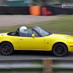 Yellow Mazda Eunos Roadster L422PTV