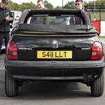 Black Vauxhall Corsa Cabrio S411LLT