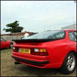 Red Porsche 944 Turbo C185RRR at the Silverstone Classic 2013