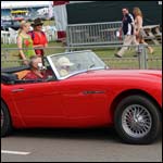 Red Austin Healey 3000 AKV266A at the Silverstone Classic 2013