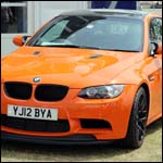 Orange BMW M3 at the Silverstone Classic 2013