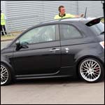 Black Fiat 500 at the Silverstone Classic 2013