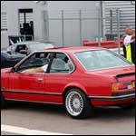 Red BMW 635CSi B984GWF at the Silverstone Classic 2013