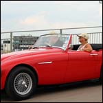 Red Austin Healey 3000 at the Silverstone Classic 2013