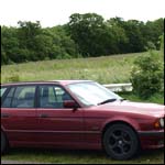 Dark red E34 BMW 5 Series Touring M272XVE