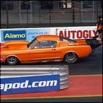Pete Creswell - Orange 1965 Ford Mustang 598ci - Super Comp