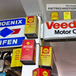 Phoenix Reifen and Veedol Motor Oil Signage